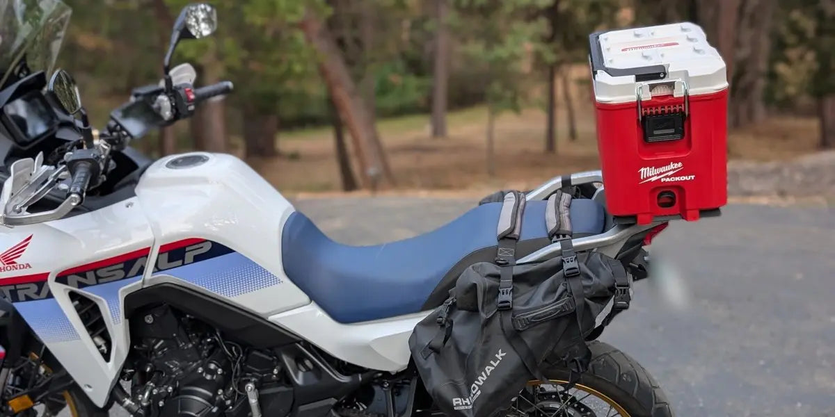 Honda XL750 Transalp with a Milwaukee PACKOUT cooler on a BOCO Custom undermount plate