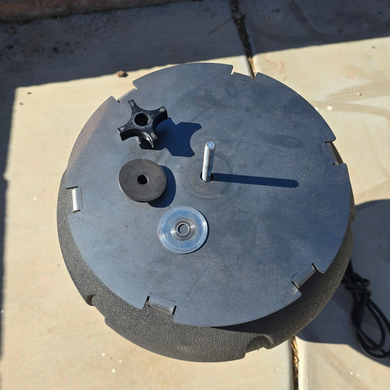 factory hardware used for the replacement lid of a vibratory tumbler being used 
